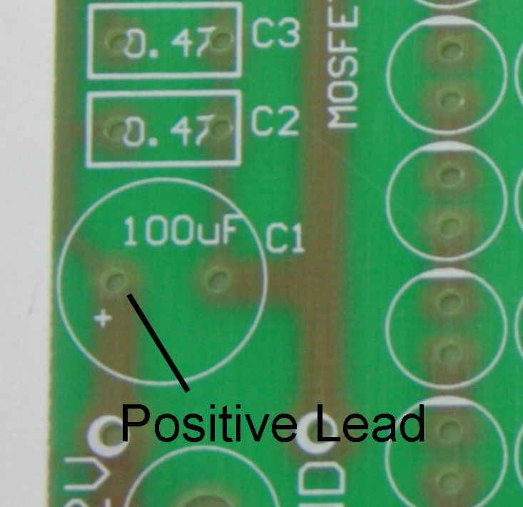 capacitor polarity markings